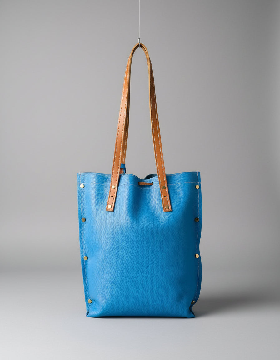 Sac fourre-tout en cuir de taurillon bleu avec liens de serrage